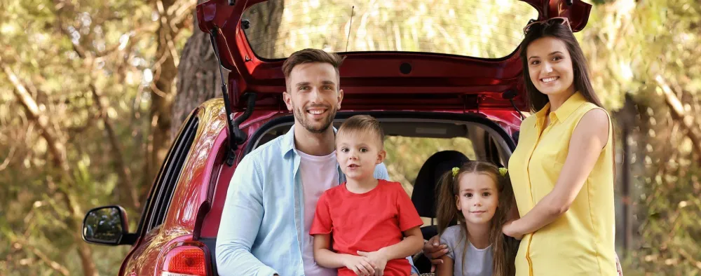 A family loading their car