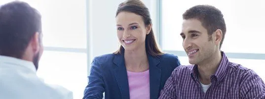 An agent meeting with a couple